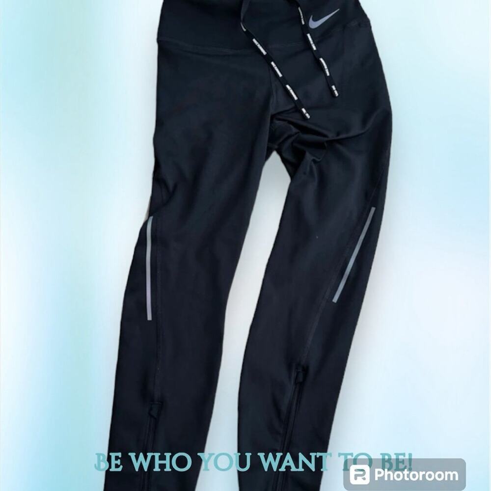 NIKE DRI-FIT ankle zip, women's size S, Jett black with reflective strips.